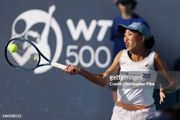 Shuai Zhang of China in action while playing with Luisa Stefani of Brazil against Shuko Aoyama of Japan and Hao-Ching Chan of Chinese Taipei during...