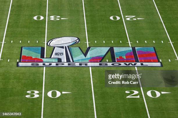 The Super Bowl LVII logo is seen on the field prior to Super Bowl LVII between the Kansas City Chiefs and the Philadelphia Eagles at State Farm...
