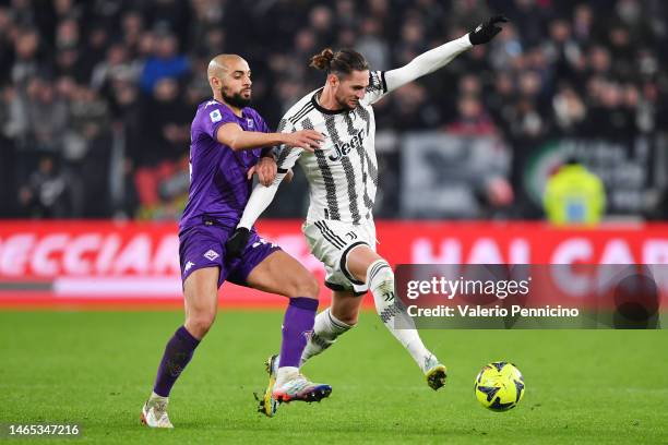 Adrien Rabiot of Juventus battles for possession with Sofyan Amrabat of ACF Fiorentina during the Serie A match between Juventus and ACF Fiorentina...