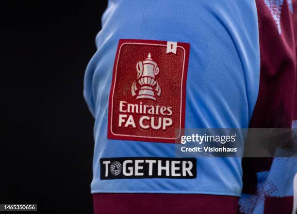 The official Emirates FA Cup badge on the sleeve of a Burnley shirt during the Emirates FA Cup Fourth Round Replay match between Burnley FC and...