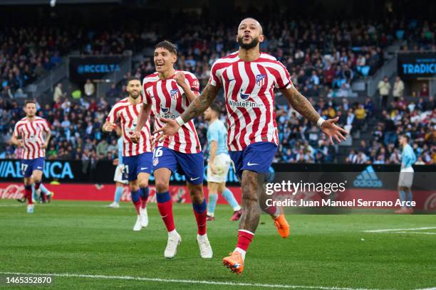 Memphis Depay of Club Atletico de Madrid celebrates after scoring goal during the LaLiga Santander match between RC Celta and Atletico de Madrid at...