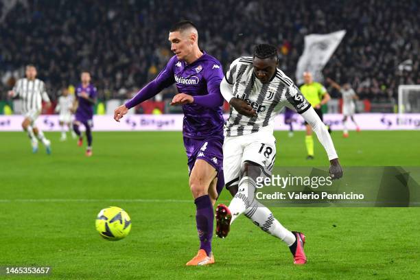 Moise Kean of Juventus battles for possession with Nikola Milenkovic of ACF Fiorentina during the Serie A match between Juventus and ACF Fiorentina...