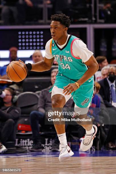 Stanley Johnson of the San Antonio Spurs dribbles up the court in the first half of a game against the Detroit Pistons at Little Caesars Arena on...