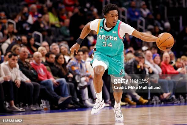 Stanley Johnson of the San Antonio Spurs dribbles up the court in the first half of a game against the Detroit Pistons at Little Caesars Arena on...