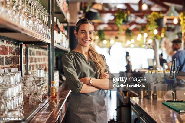 small business, bartender and portrait of owner, woman with smile at pub counter, hospitality startup investment in alcohol sales. success, confidence and service industry manager at bespoke wine bar - resourceful bildbanksfoton och bilder