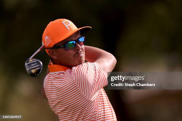 Rickie Fowler of the United States plays his shot from the fifth tee during the final round of the WM Phoenix Open at TPC Scottsdale on February 12,...