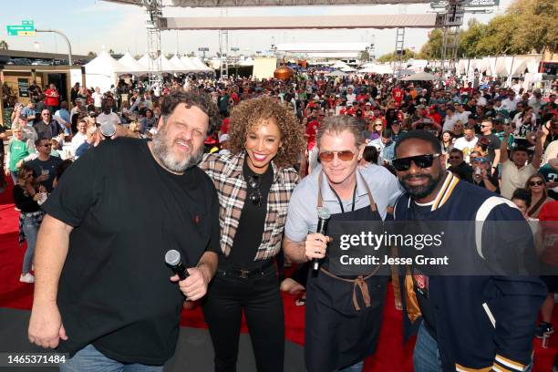 Aaron May, Sage Steele, Bobby Flay, and DJ Irie attend The Players Tailgate Hosted By Bobby Flay and presented by Bullseye Event Group for Super Bowl...