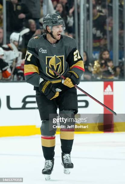 Shea Theodore of the Vegas Golden Knights celebrates after scoring a goal during the third period against the Anaheim Ducks at T-Mobile Arena on...