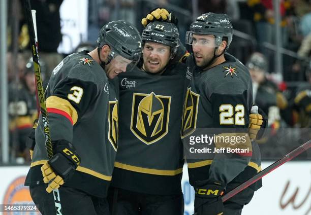 Shea Theodore of the Vegas Golden Knights celebrates with teammates after scoring a goal during the third period against the Anaheim Ducks at...