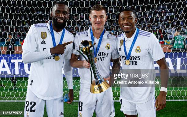 Toni Kroos player of Real Madrid poses with teammates Antonio Rudiger and David Alaba as they celebrate after winning the FIFA Club World Cup Morocco...