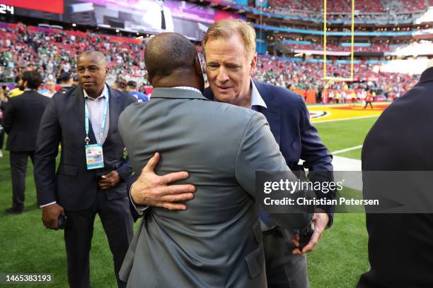 Executive director DeMaurice Smith greets NFL Commissioner Roger Goodell pose for a picture before Super Bowl LVII between the Kansas City Chiefs and...