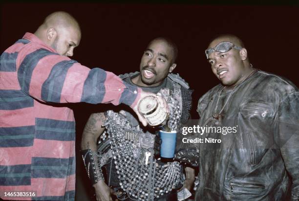 From left, American record executive Suge Knight , Rap musician Tupac Shakur , and rapper and producer Dr Dre on the set of Shakur's 'California...
