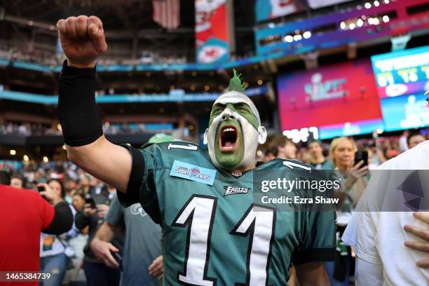 Philadelphia Eagles fans cheer before Super Bowl LVII between the Kansas City Chiefs and the Philadelphia Eagles at State Farm Stadium on February...
