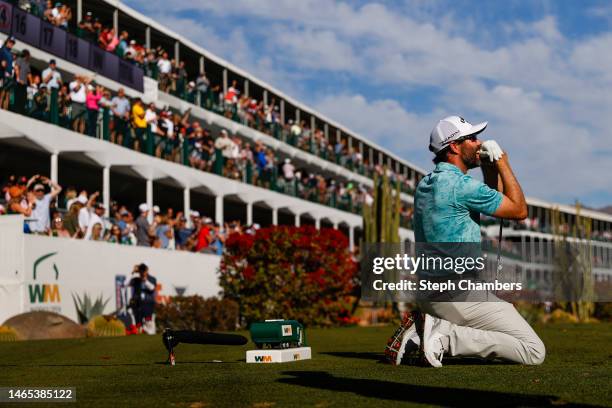 Adam Hadwin of Canada reacts to his tee shot on the 16th hole during the final round of the WM Phoenix Open at TPC Scottsdale on February 12, 2023 in...