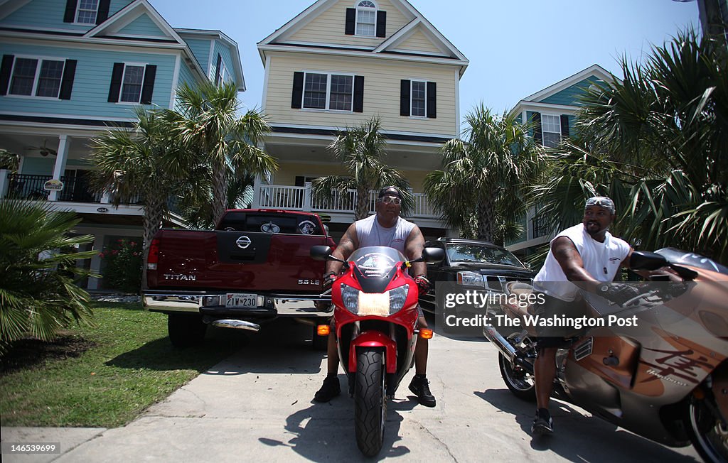 Outside their beach rental house in Surfside Beach, South Carolina, members of the DC Sportbike Riders leave Thursday for a ride to North Myrtle Beach. ...
