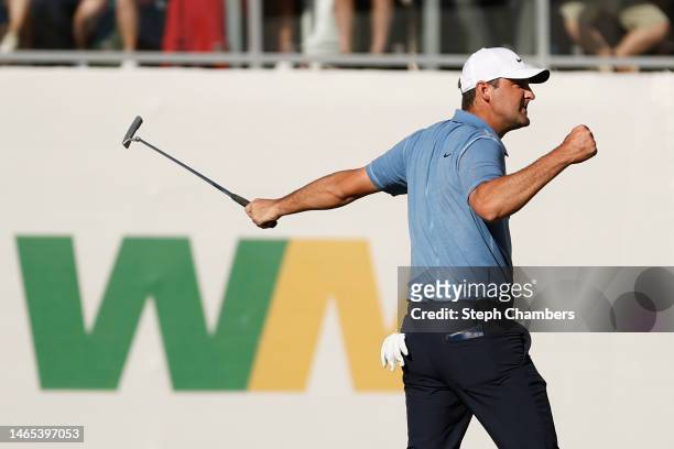 Scottie Scheffler of the United States reacts on the 16th green during the final round of the WM Phoenix Open at TPC Scottsdale on February 12, 2023...