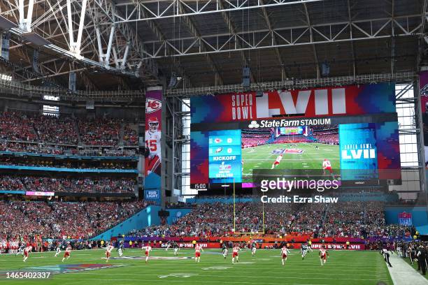 Harrison Butker of the Kansas City Chiefs kicks the opening kickoff against the Philadelphia Eagles in the first quarter of in Super Bowl LVII at...