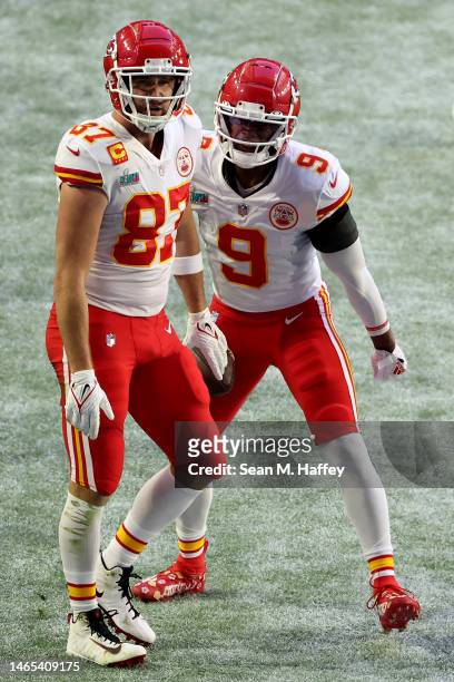 Travis Kelce of the Kansas City Chiefs celebrates with JuJu Smith-Schuster of the Kansas City Chiefs after catching an 18 yard touchdown pass during...