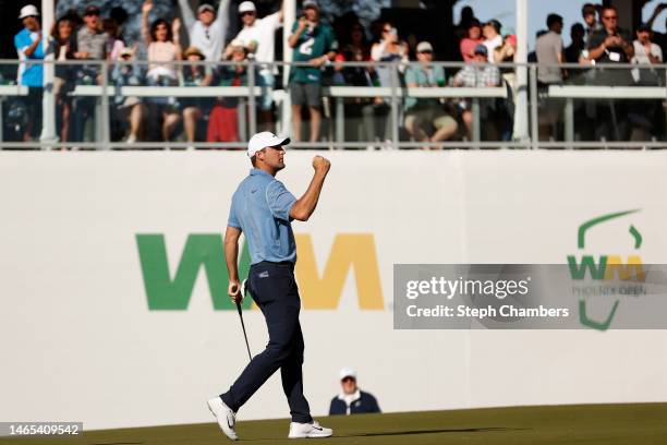 Scottie Scheffler of the United States reacts on the 16th green during the final round of the WM Phoenix Open at TPC Scottsdale on February 12, 2023...