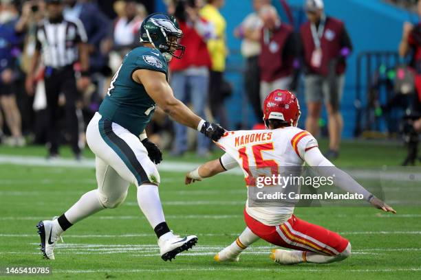 Ndamukong Suh of the Philadelphia Eagles pressures Patrick Mahomes of the Kansas City Chiefs during the first quarter in Super Bowl LVII at State...