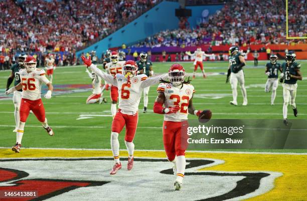 Nick Bolton of the Kansas City Chiefs celebrates after scoring a 36 yard touchdown on fumble recovery during the second quarter against the...