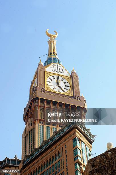 View of the Abraj Al-Bait Towers seen on June 17 also known as the Mecca Royal Hotel Clock Tower, in the holy city of Mecca. AFP PHOTO/FAYEZ NURELDINE