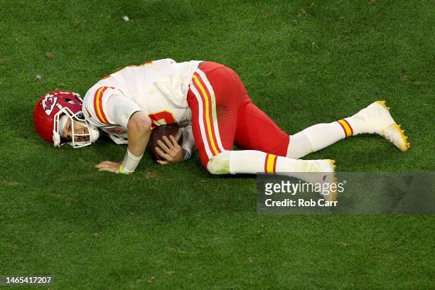 Patrick Mahomes of the Kansas City Chiefs lays on the field with an apparent injury during the second quarter against the Philadelphia Eagles in...
