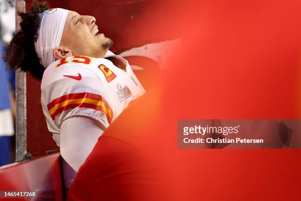 Patrick Mahomes of the Kansas City Chiefs reacts on the bench after an apparent injury during the second quarter against the Philadelphia Eagles in...