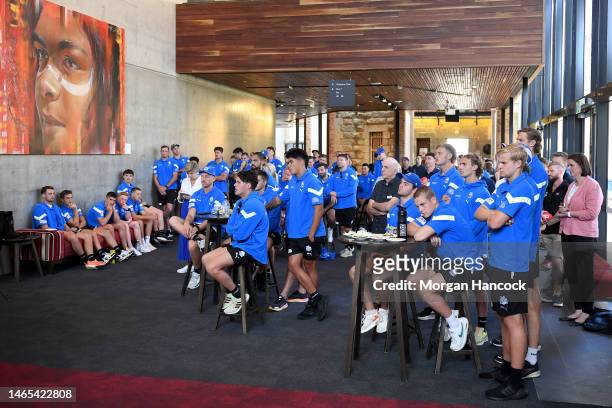 Kangaroos players watch a Welcome to Country ceremony during the North Melbourne Kangaroos AFL Community Camp at Ulumbarra Theatre on on February 13,...