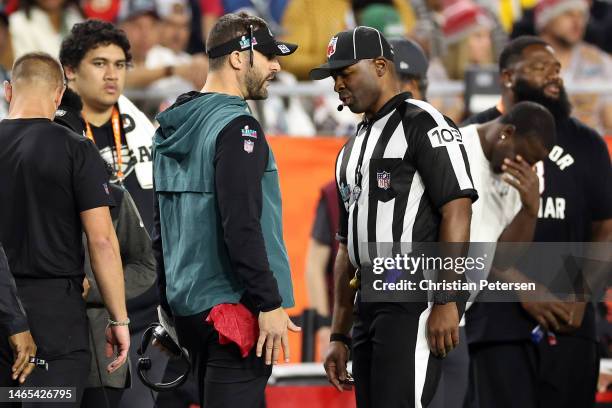 Head Coach Nick Sirianni of the Philadelphia Eagles speaks with side judge Eugene Hall during the third quarter against the Kansas City Chiefs in...