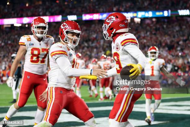 Kadarius Toney of the Kansas City Chiefs celebrates with Patrick Mahomes of the Kansas City Chiefs after a five yard touchdown reception against the...