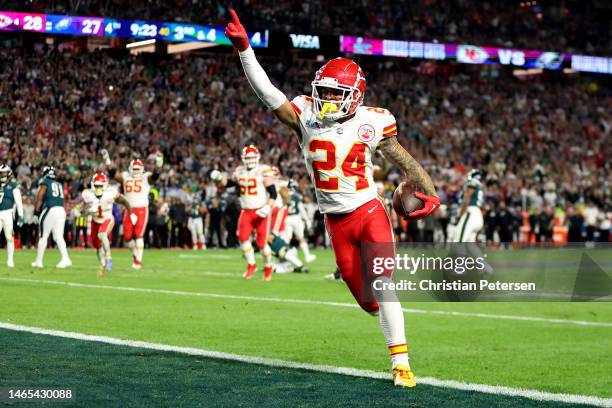 Skyy Moore of the Kansas City Chiefs celebrates after scoring on a 4 yard touchdown pass during the third quarter against the Philadelphia Eagles in...