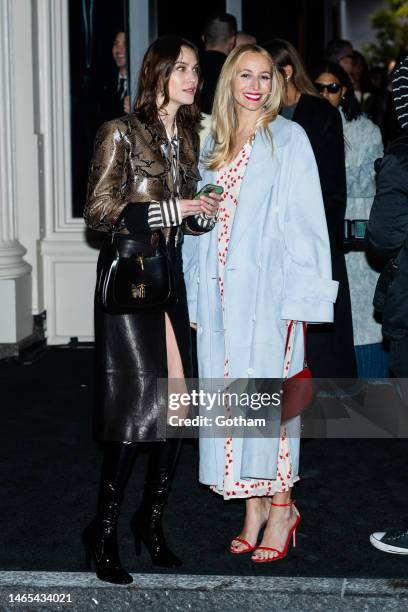 Alexa Chung and Harley Viera-Newton attend the Khaite fashion show during New York Fashion Week in SoHo on February 12, 2023 in New York City.