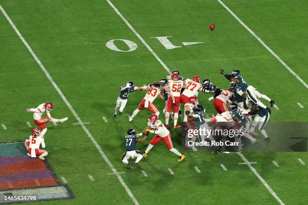 Harrison Butker of the Kansas City Chiefs kicks the go ahead field goal during the fourth quarter against the Philadelphia Eagles in Super Bowl LVII...