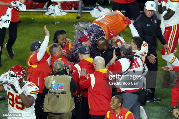 Skyy Moore and Head coach Andy Reid of the Kansas City Chiefs celebrate after defeating the Philadelphia Eagles 38-35 to win Super Bowl LVII at State...