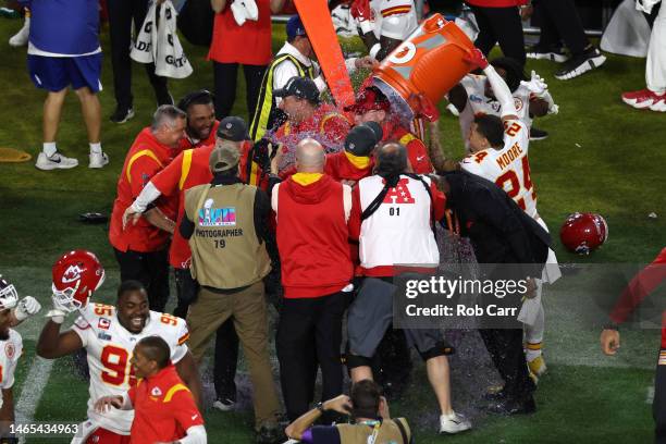 Skyy Moore and Head coach Andy Reid of the Kansas City Chiefs celebrate after defeating the Philadelphia Eagles 38-35 to win Super Bowl LVII at State...