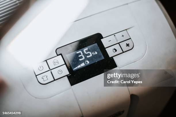 dehumidifier at home - humidity stock pictures, royalty-free photos & images
