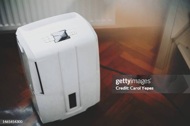dehumidifier at home - industrial air conditioning unit stock pictures, royalty-free photos & images