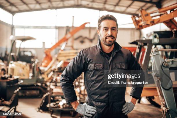 mechanic in the office - blue collar portrait stock pictures, royalty-free photos & images