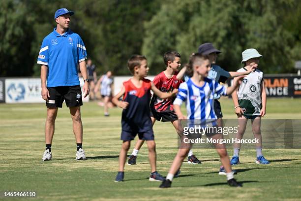 Aidan Corr of the Kangaroos participates in a drill during the North Melbourne Kangaroos AFL Community Camp at the Rochester Recreation Reserve on on...