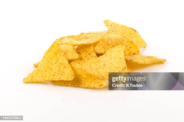 salted corn snack nachos chips isolated on white - nacho chip stock pictures, royalty-free photos & images