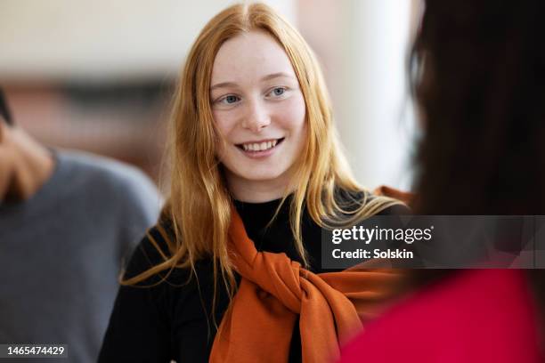 teenage school girl in conversation, smiling - student organization stock pictures, royalty-free photos & images