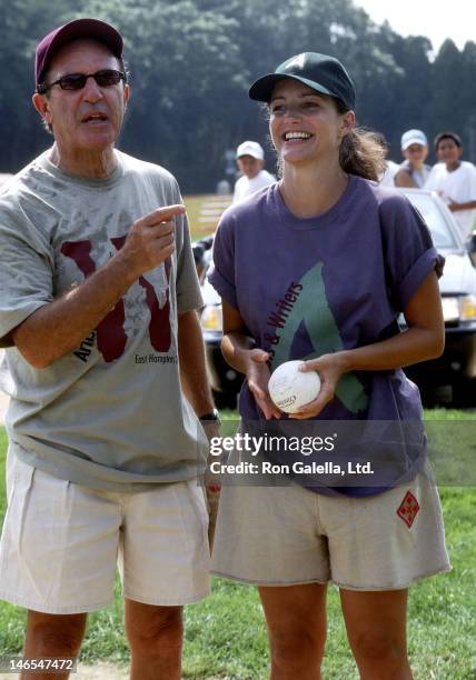 Athlete Dale Berra and actress Kristin Davis attend the 54th Annual Artists vs. Writers Softball Game on August 17, 2002 at Herrick Park in East...