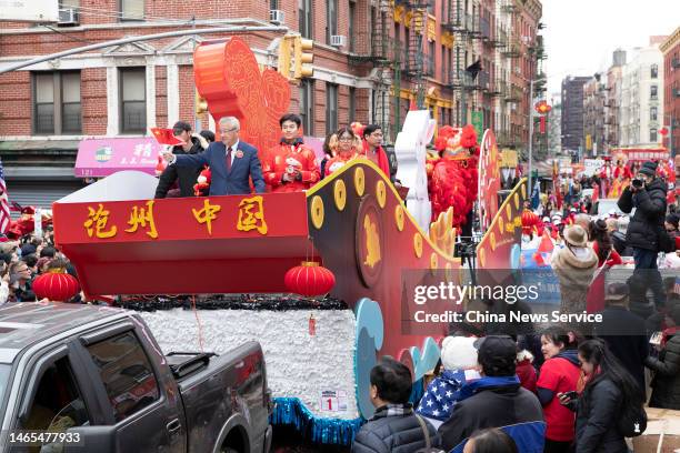 People take part in the 25th Annual New York City Lunar New Year Parade in the Chinatown neighborhood of Manhattan on February 12, 2023 in New York...