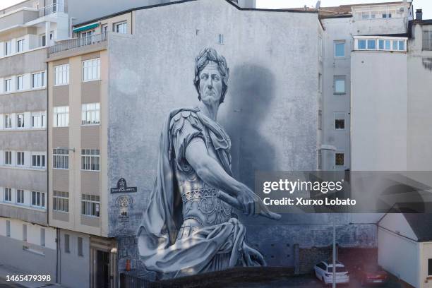 Mural with the figure of the leader of the Roman Empire Julio Cesar, made by Diego As, is on the facade of a house next to the Roman wall on February...
