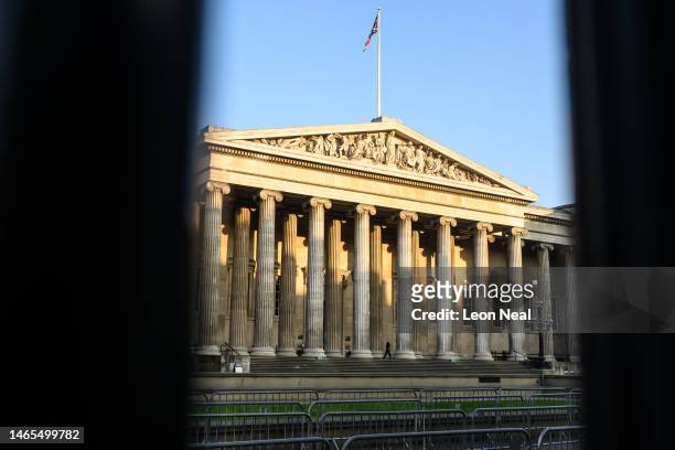Security guard looks towards the empty courtyard as PCS union members and supporters picket outside the British Museum during a week-long strike...