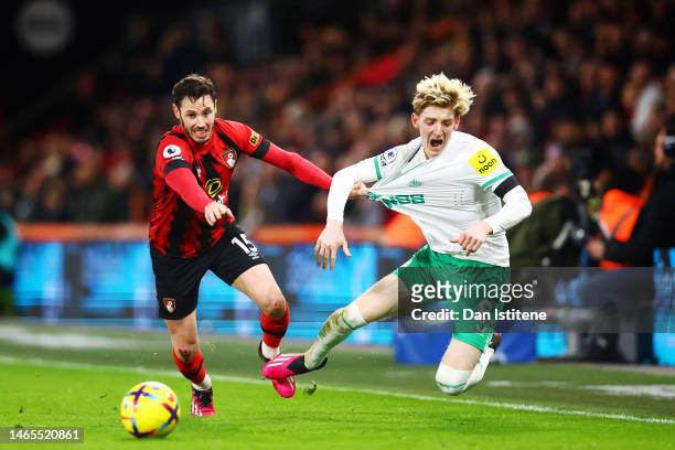 Adam Smith of AFC Bournemouth battles for the ball with Anthony Gordon of Newcastle United during the Premier League match between AFC Bournemouth...