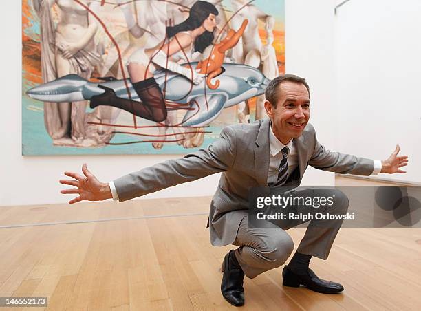 Artist Jeff Koons poses in front of his art work 'Antiquity 3, 2011' during the opening of the exhibition 'Jeff Koons. The Painter & The Sculptor' at...