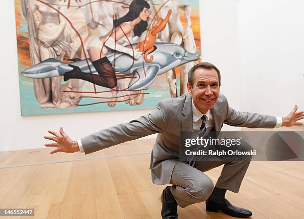 Artist Jeff Koons poses in front of his art work 'Antiquity 3, 2011' during the opening of the exhibition 'Jeff Koons. The Painter & The Sculptor' at...