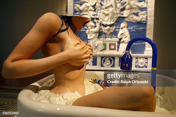 The art work 'Woman In Tub' of artist Jeff Koons is displayed during the opening of the exhibition 'Jeff Koons. The Painter & The Sculptor' at the...